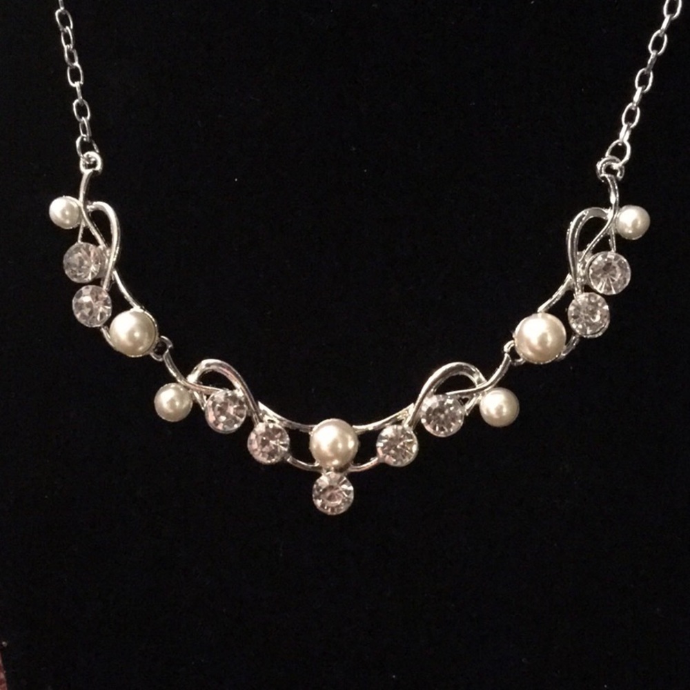 Pearl & diamond encrusted set.